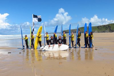 Surfing group on the beach