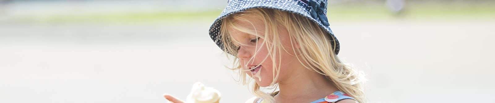 little girl enjoying an ice cream