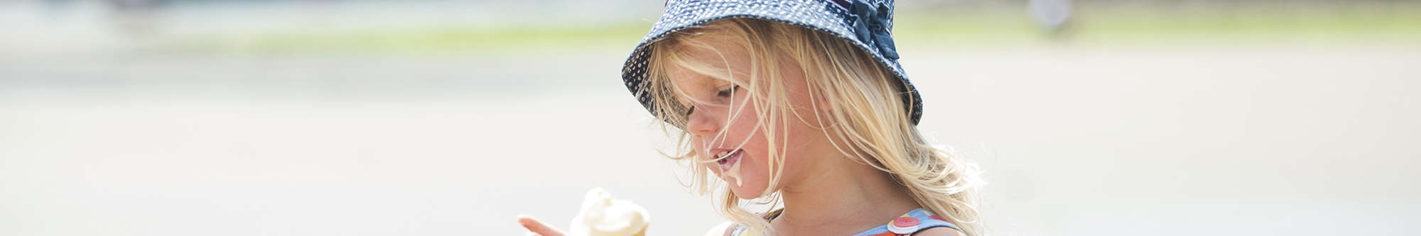 little girl enjoying an ice cream