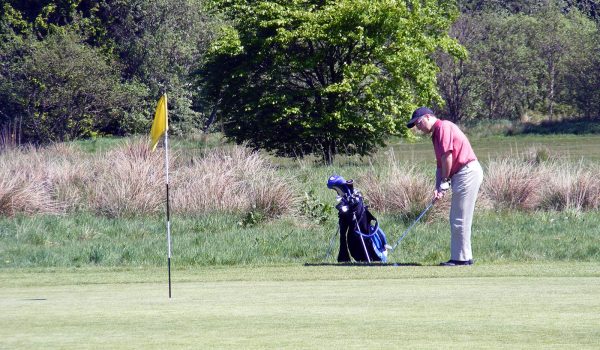 man playing golf