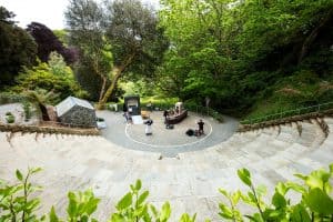 People performing in amphitheatre at Trebah