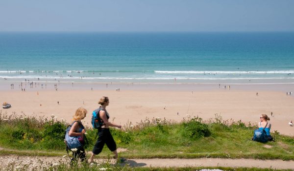 walkers by Watergate Bay