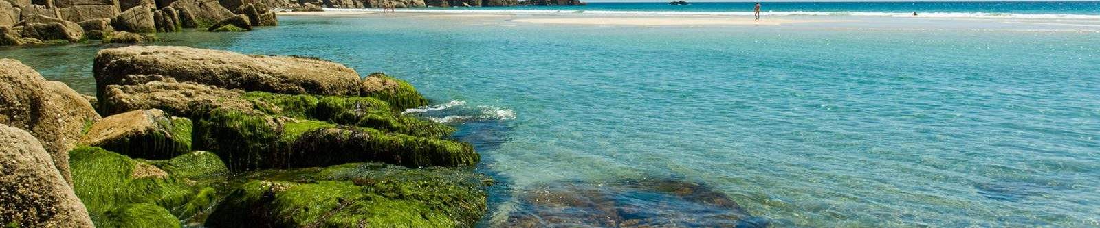 view of clear blue sea at Porthcurno