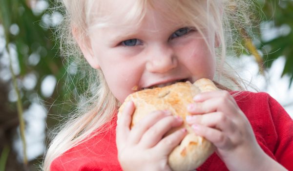 girl eating pasty