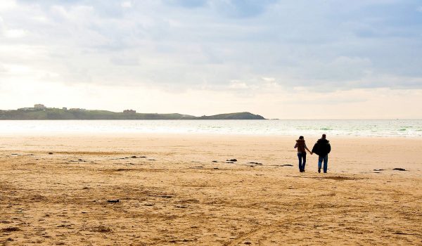 couple on beach in winter