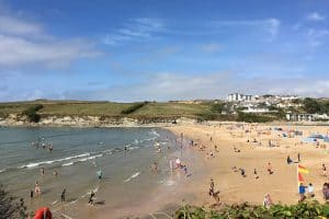 view of people on Porth beach in the summer