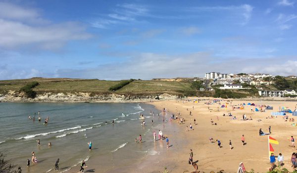 view of people on Porth beach in the summer