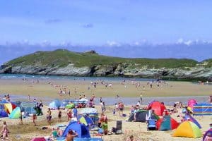 Crowds of people enjoying Porth beach