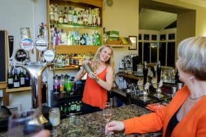 Molly making cocktails