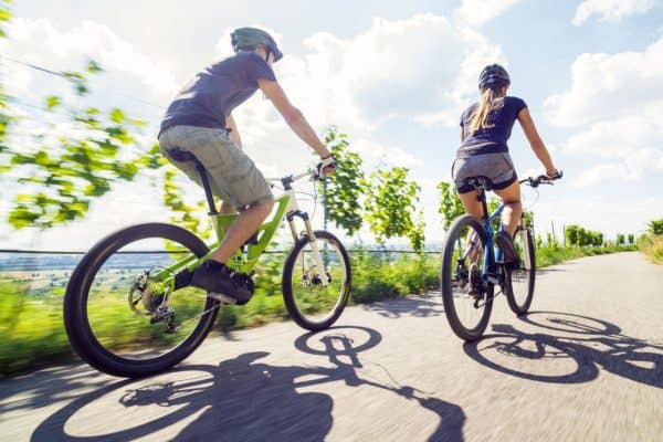 Young couple on mountain bikes